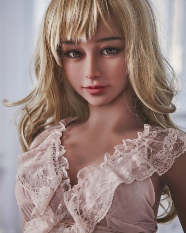 Real sex doll with long blonde hair and detailed facial features for realistic experience.