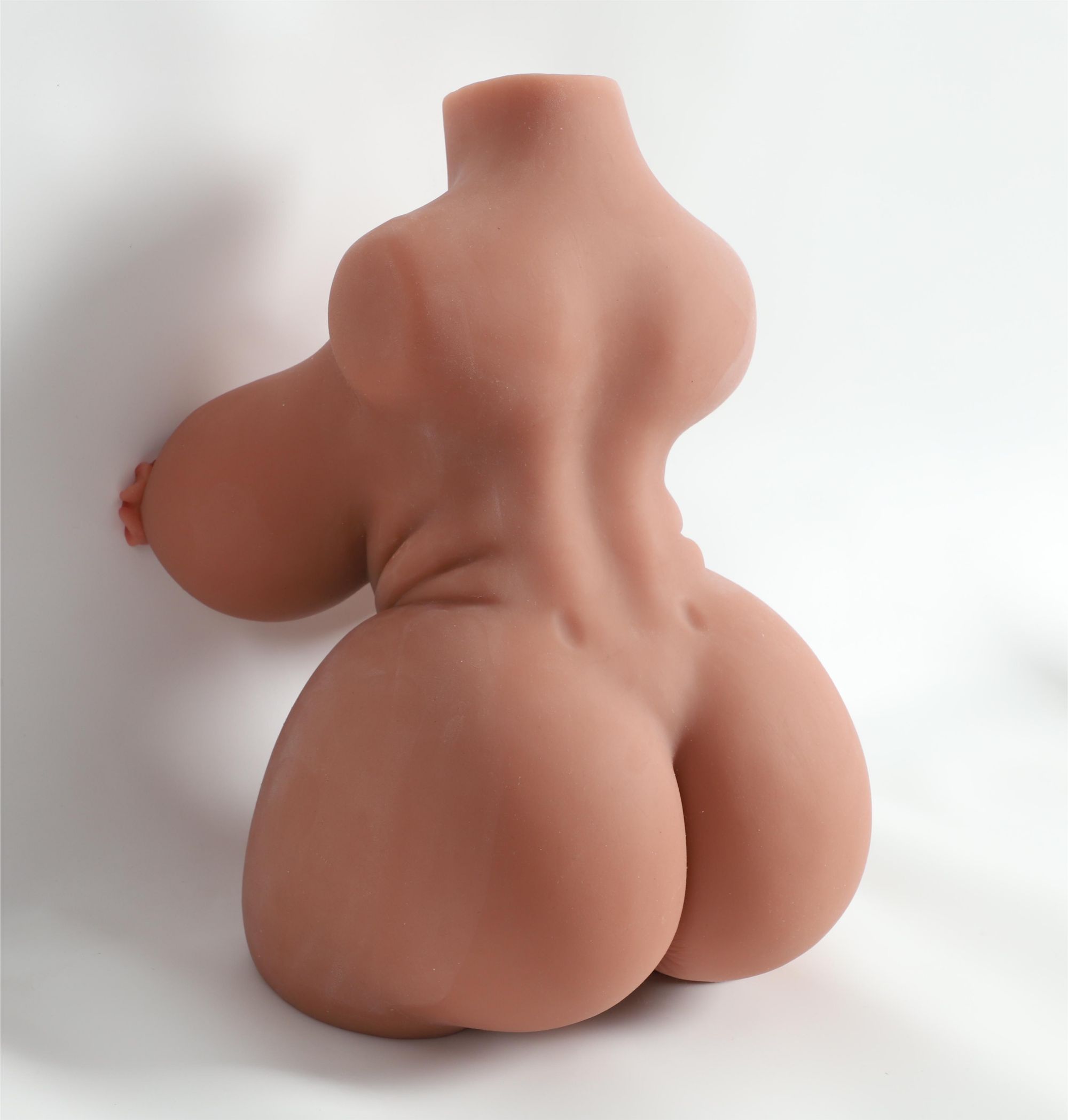Four channel sex doll torsos11 Realistic sex doll torso with detailed curves and skin texture.