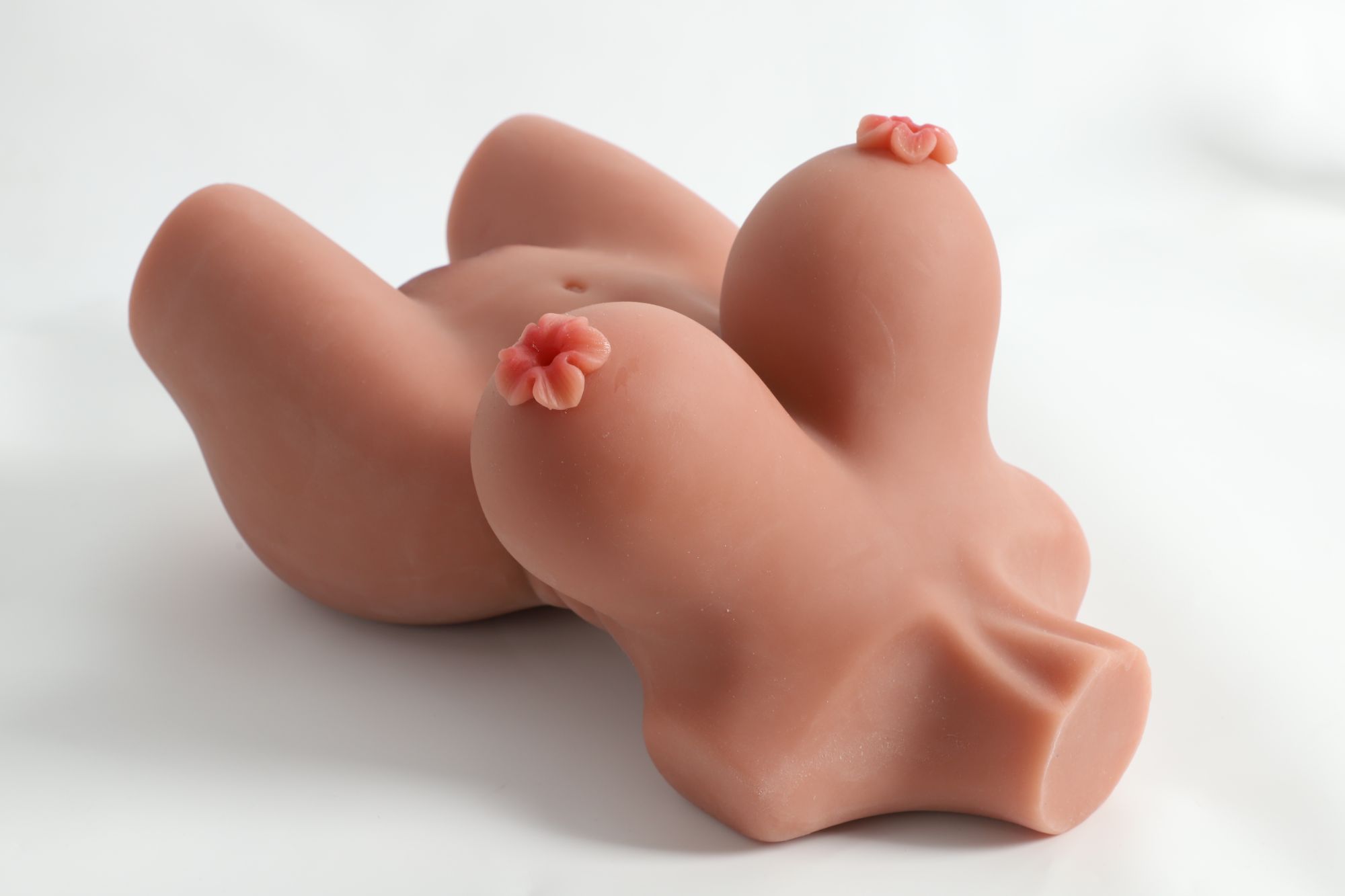 Four channel sex doll torsos12 Realistic sex doll torso with small breasts and detailed features.